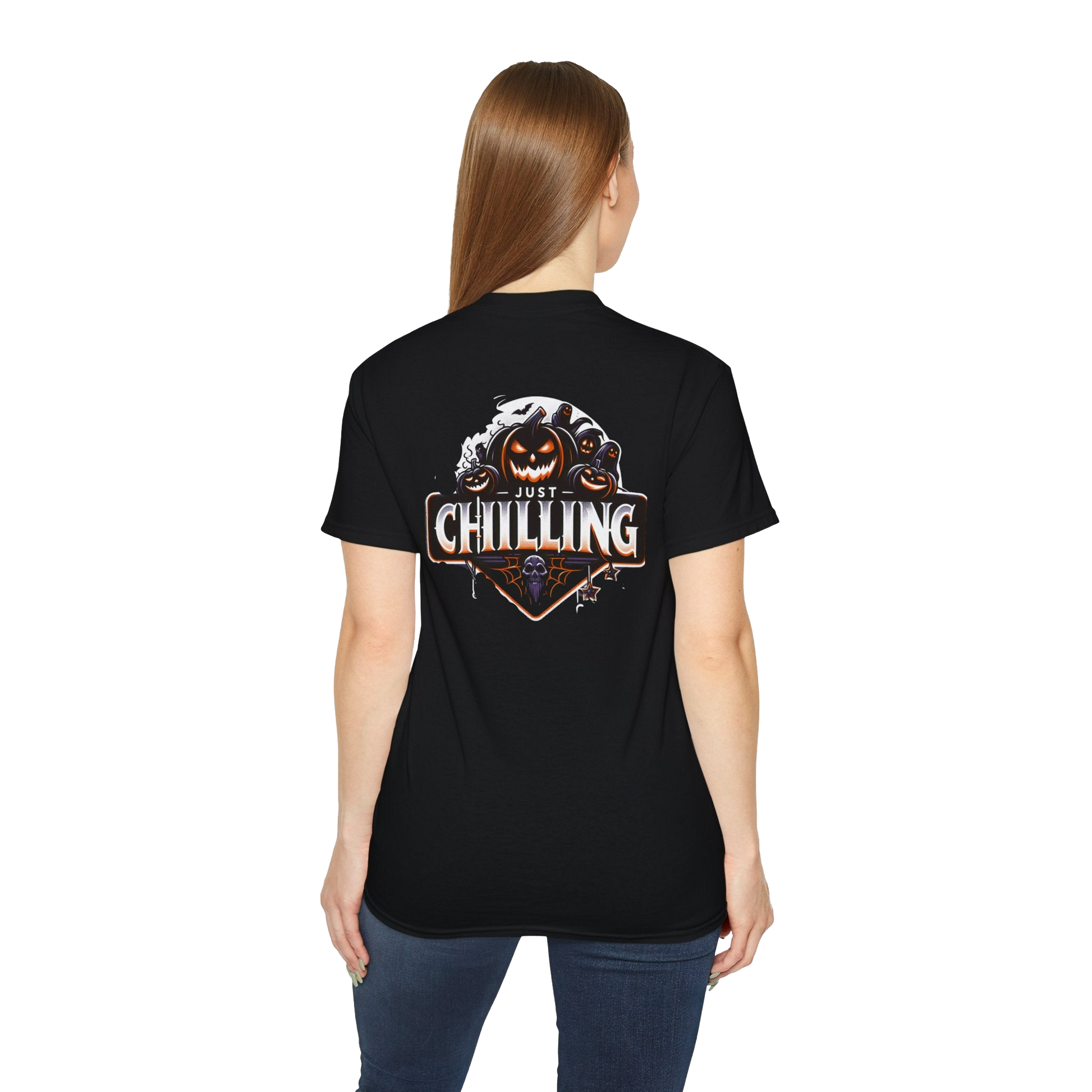 A woman wearing a black t-shirt with a graphic design on the back.