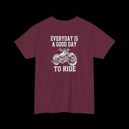 A maroon t-shirt with a white graphic design and text printed on it.