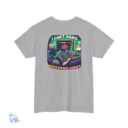A gray t-shirt with a colorful graphic design depicting a person lounging in a chair with a computer monitor in front of them, surrounded by various objects and text.