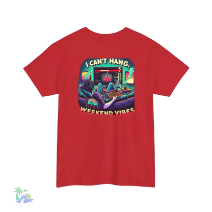 A red t-shirt with a colorful graphic design depicting a person lounging in a chair with a computer monitor in front of them, surrounded by various objects and text.