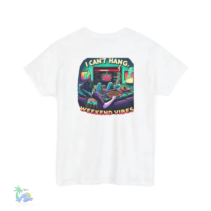 A white t-shirt with a colorful graphic design depicting a person lounging in a chair with a computer monitor in front of them, surrounded by various objects and text.