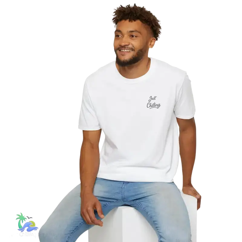 White t-shirt with ’Just Chilling’ text.