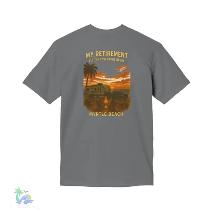A gray t-shirt with a graphic design depicting a beach scene at sunset, including palm trees, a car, and a person.