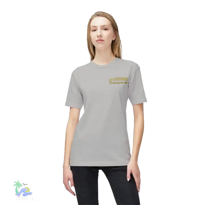 A woman wearing a grey t-shirt with a yellow text logo on the left side of her chest.