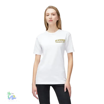 A woman wearing a white t-shirt with a gold text logo on it, standing against a black background.