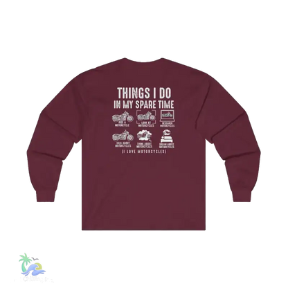 The image is a maroon long-sleeved shirt with white text on the back, which reads "THINGS I DO IN MY SPARE TIME" and includes various motorcycle-related activities such as riding, driving, and discussing motorcycles.