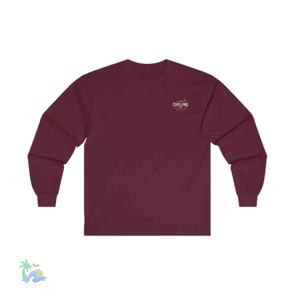 A maroon long-sleeved shirt with a small logo on the left chest area.