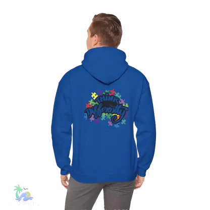 A person wearing a blue hoodie with a colorful graphic design on the back.
