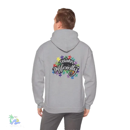 A person wearing a grey hoodie with a colorful graphic and text on the back.