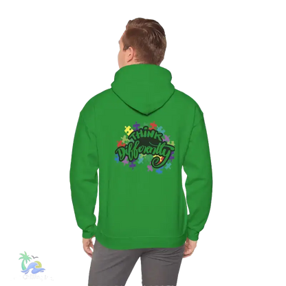 A person wearing a green hoodie with a colorful graphic and text on the back.