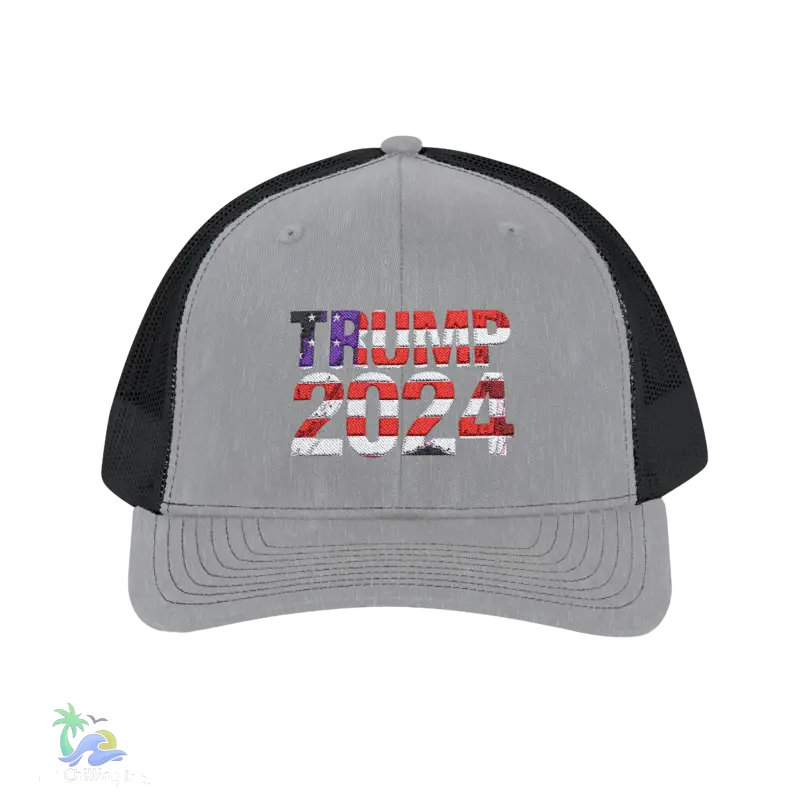 a gray and black trucker hat with the words trump on it