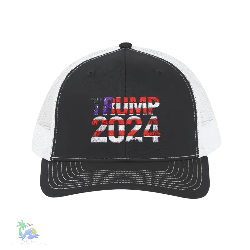 a black and white trucker hat with the words trump on it