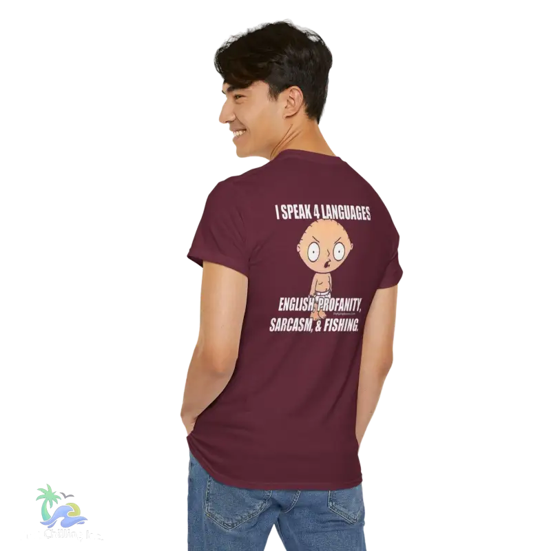 a man wearing a maroon t - shirt with a cartoon character on it