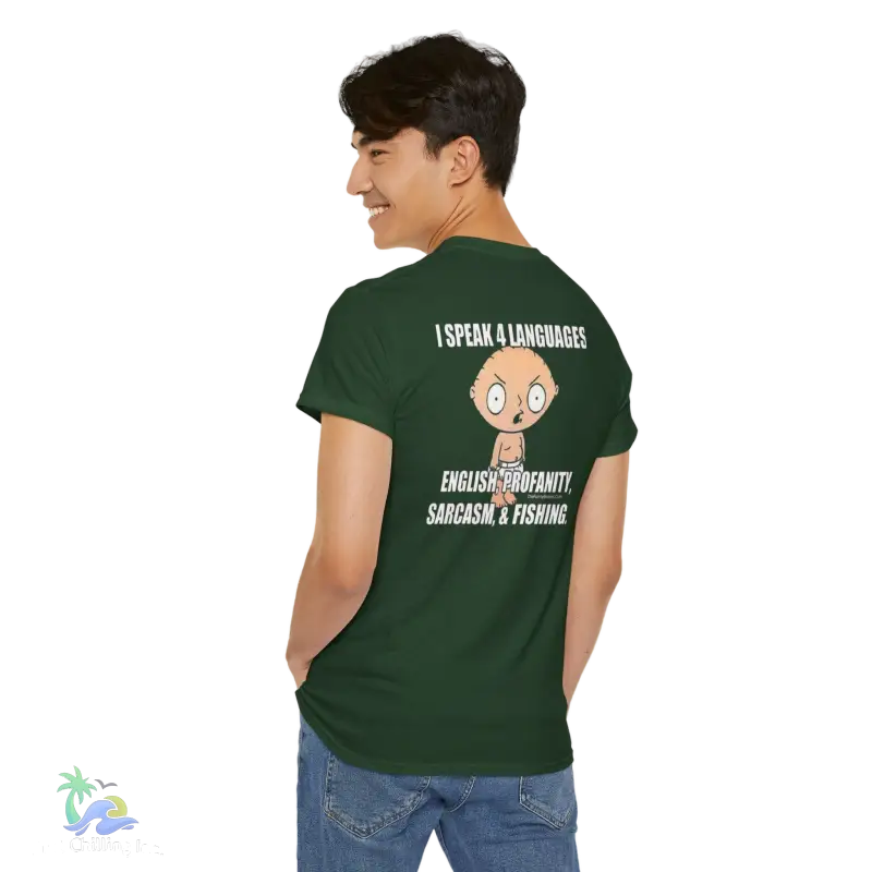a man wearing a green t - shirt with a cartoon character on it