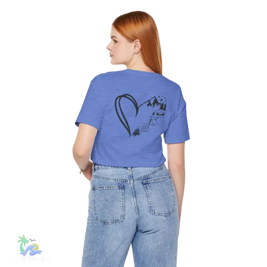 a woman wearing a blue t - shirt with a heart drawn on it