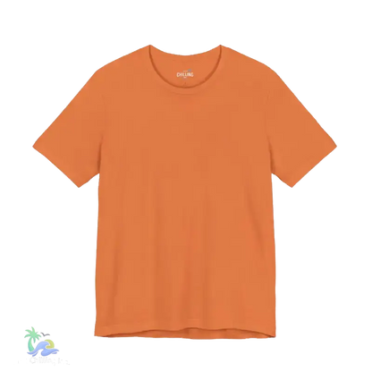 A plain, orange-colored t-shirt is shown against a black background.