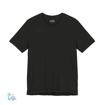 A plain black t-shirt against a black background.