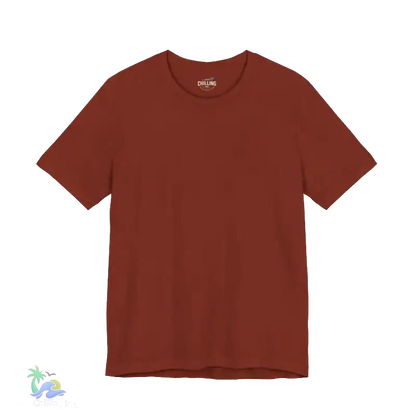 A red t-shirt is shown against a black background.