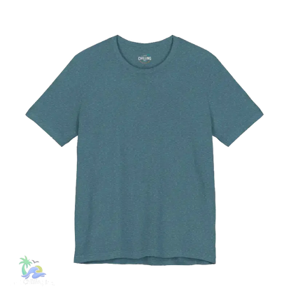 A plain teal-colored t-shirt is shown against a black background.