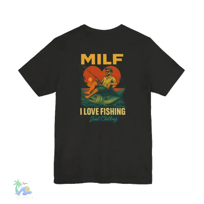 A black t-shirt with a graphic design depicting a man fishing, accompanied by the text "MILF I LOVE FISHING Just Chilling".