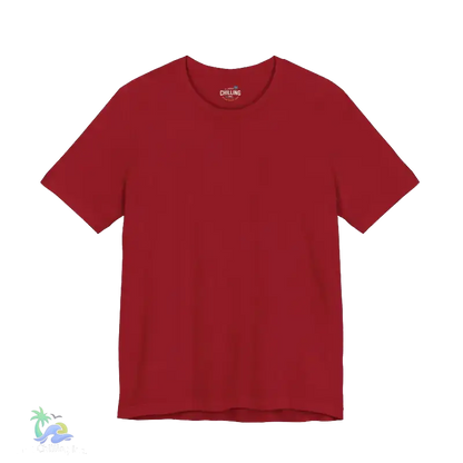 A red t-shirt against a black background.