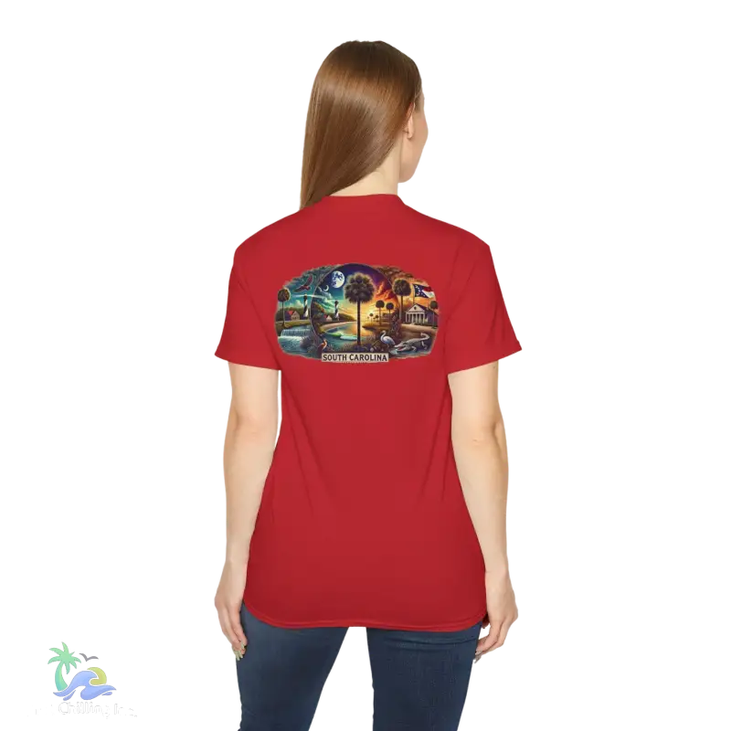 a woman wearing a red t - shirt with a picture of a train on it