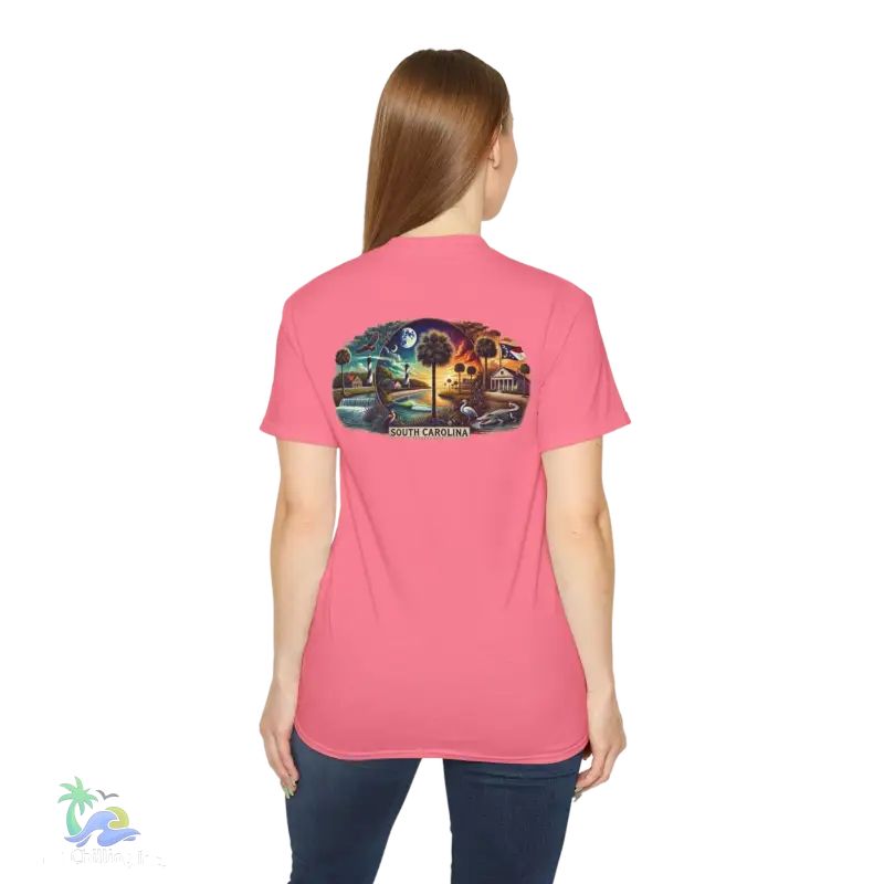 a woman wearing a pink shirt with a picture of a train on it