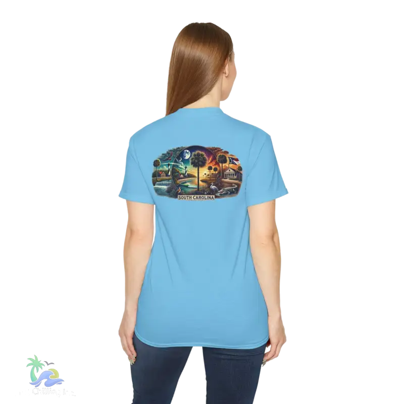 a woman wearing a blue t - shirt with a picture of a train on it