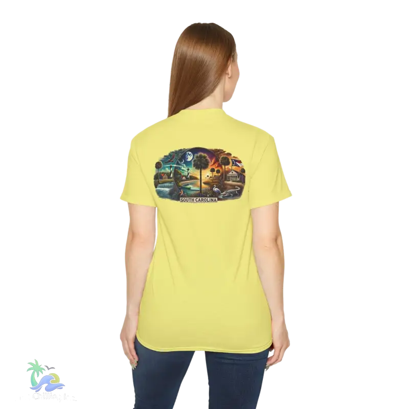 a woman wearing a yellow t - shirt with a picture of a train on it