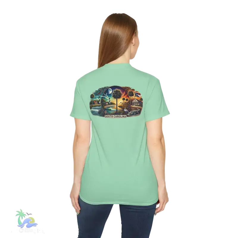 a woman wearing a green shirt with a picture of a train on it