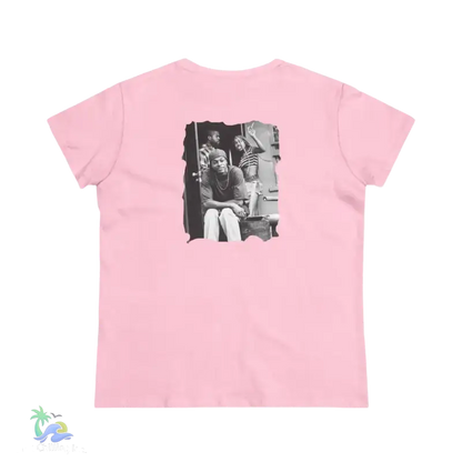A pink t-shirt with a black and white photograph of three people on the back.