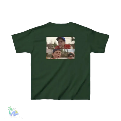 The image is a green t-shirt with a graphic design featuring two people, one of whom is making a funny facial expression. The text on the t-shirt is not clear enough to transcribe accurately.