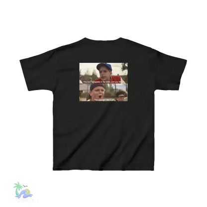 The image is a black t-shirt with a graphic design featuring two people, one of whom is making a funny facial expression. The text on the t-shirt reads "You bob for apples in the hole and you're a girl".